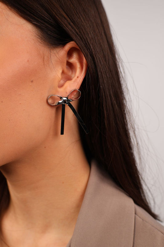 Strikjes oorbellen | Zilver