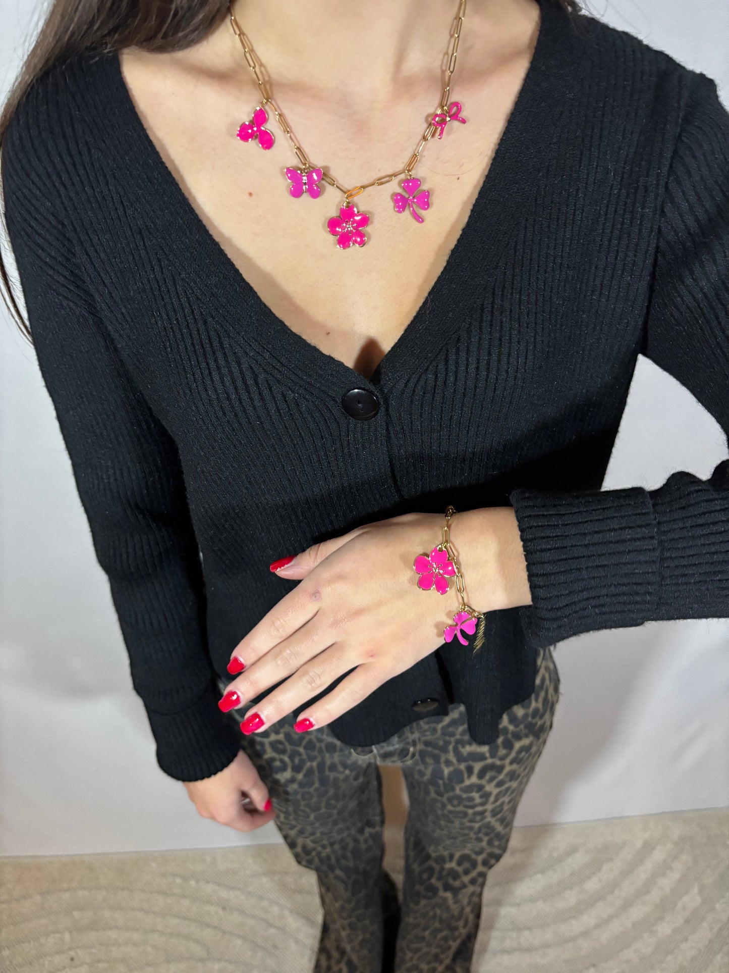 Schakelketting met roze bedels | Goud