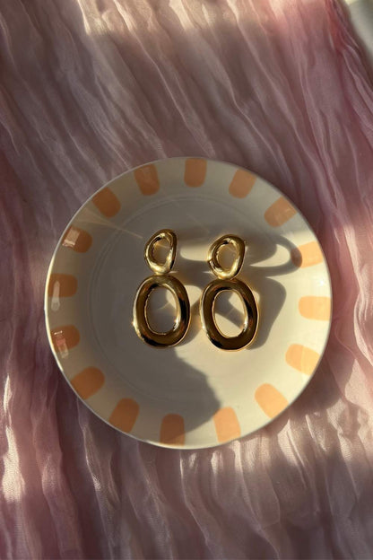 Bold oval drop oorbellen | Goud