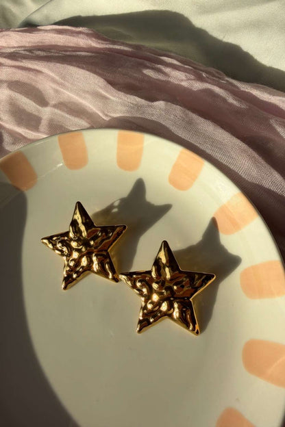 Star glow oorbellen | Goud