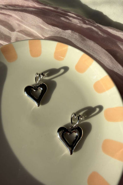 Double heart drop oorbellen | Zilver