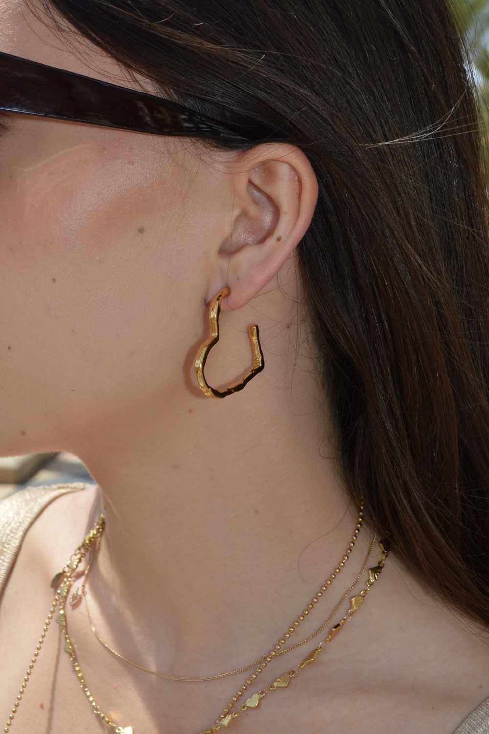 Hartjes hoops oorbellen | Goud