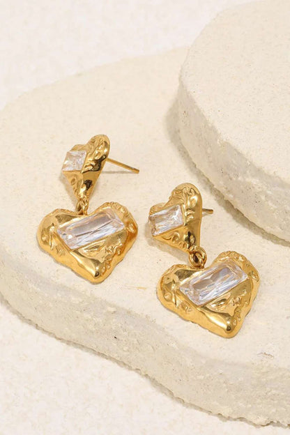 Double heart oorbellen | Goud
