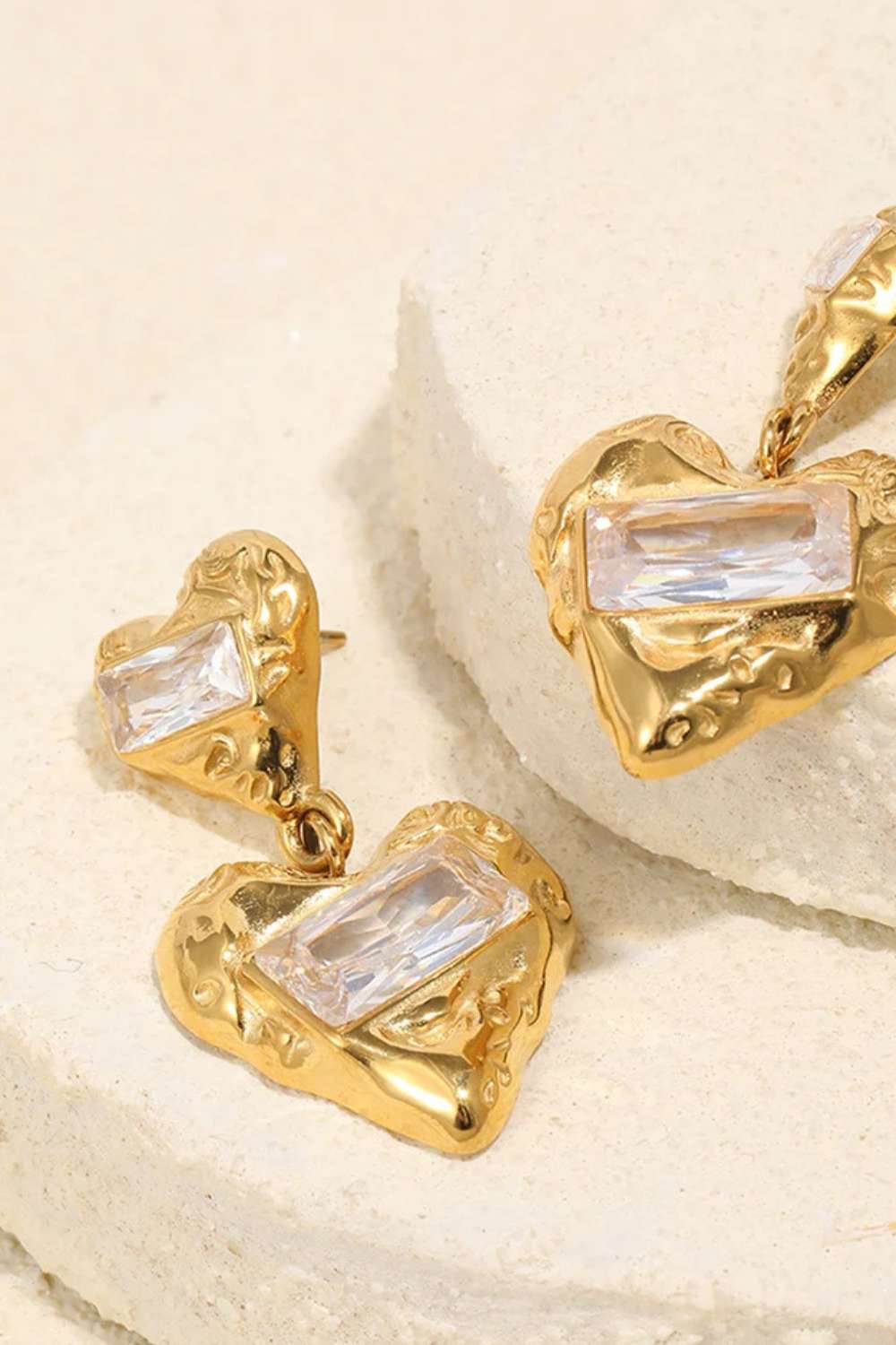 Double heart oorbellen | Goud