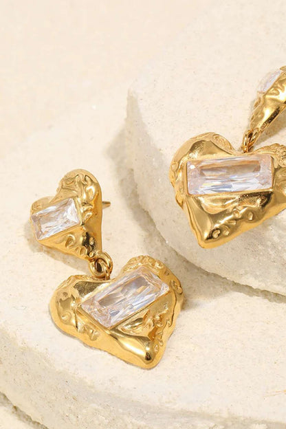 Double heart oorbellen | Goud